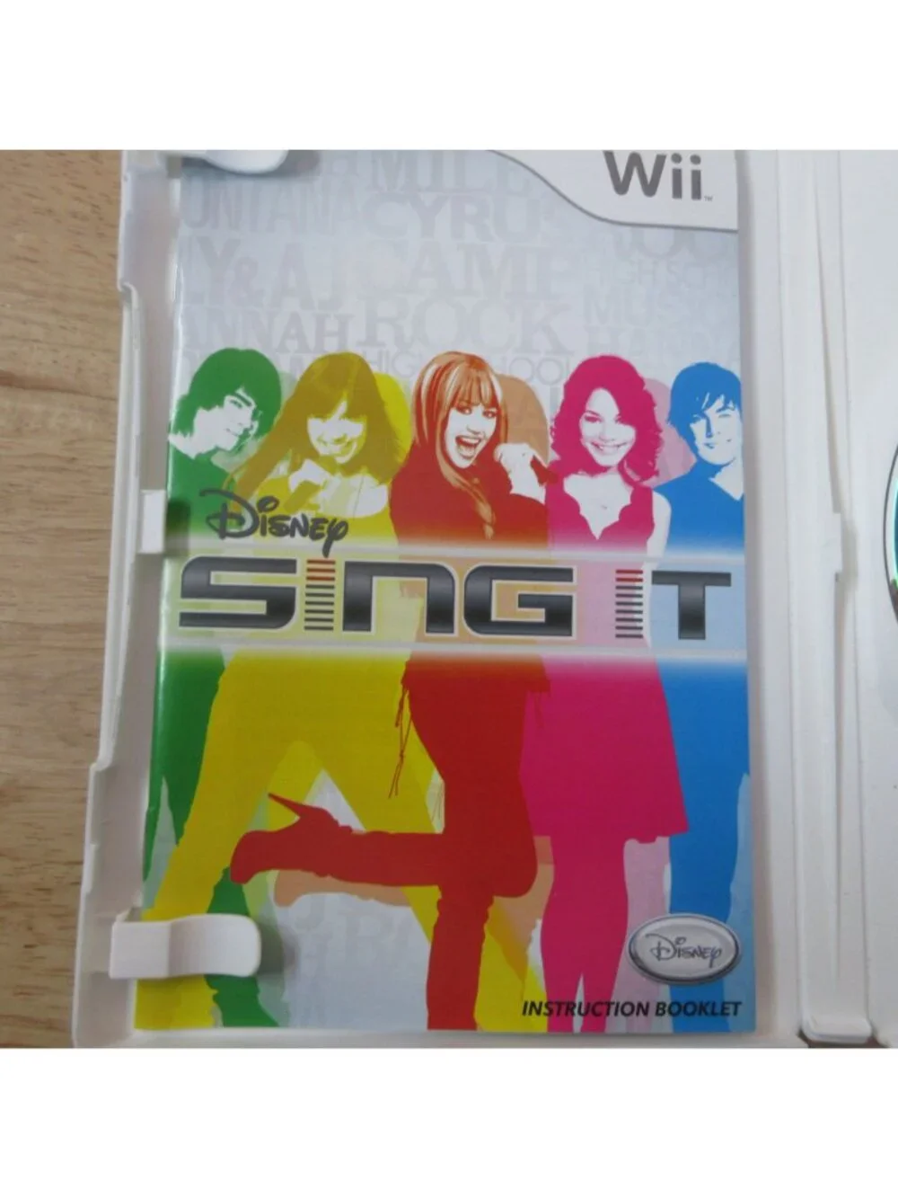 Wii Bundle of 2 Youth Video Games - Puss in Boots & Disney Sing It